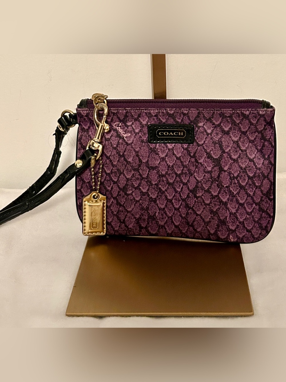 Coach Taylor Snake Print Satin Wristlet in purple and black